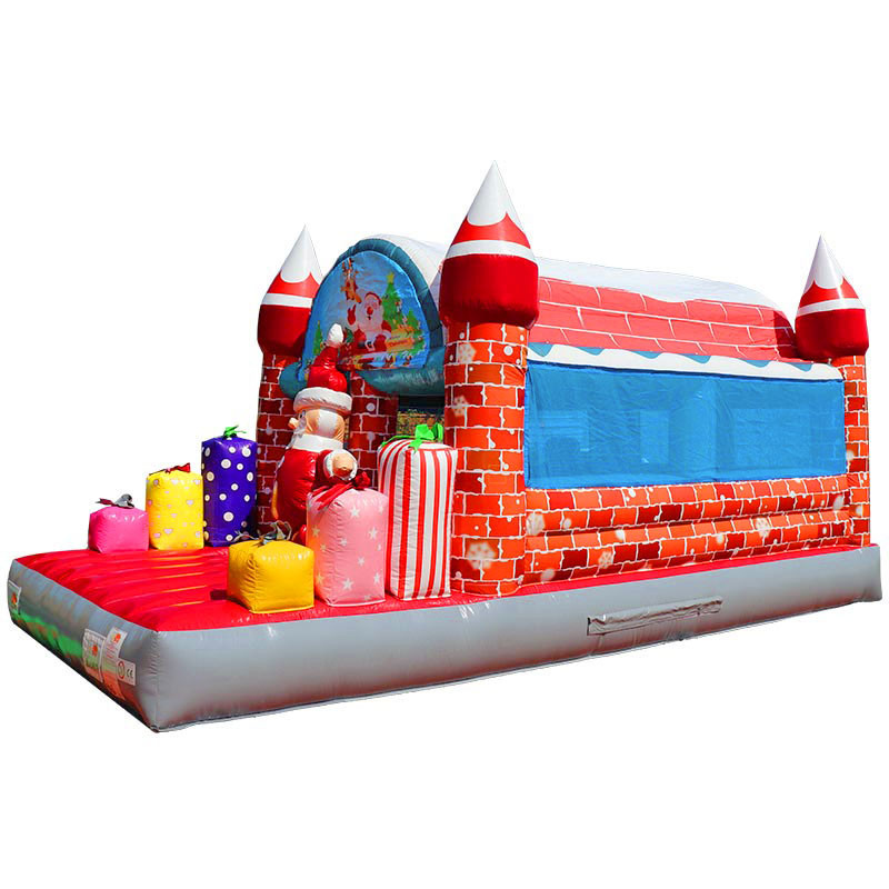 Château gonflable Père Noël avec façade festive rouge et verte - Funtastic Bassin d'Arcachon